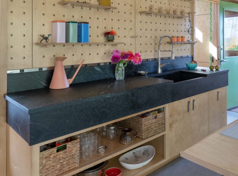 A Vermont Soapstone oiled sink is nearly black with the light veins in high contrast.