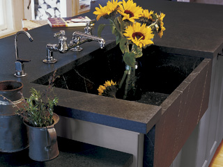 Sunflowers in a handcrafted Vermont Soapstone custom deep sink.