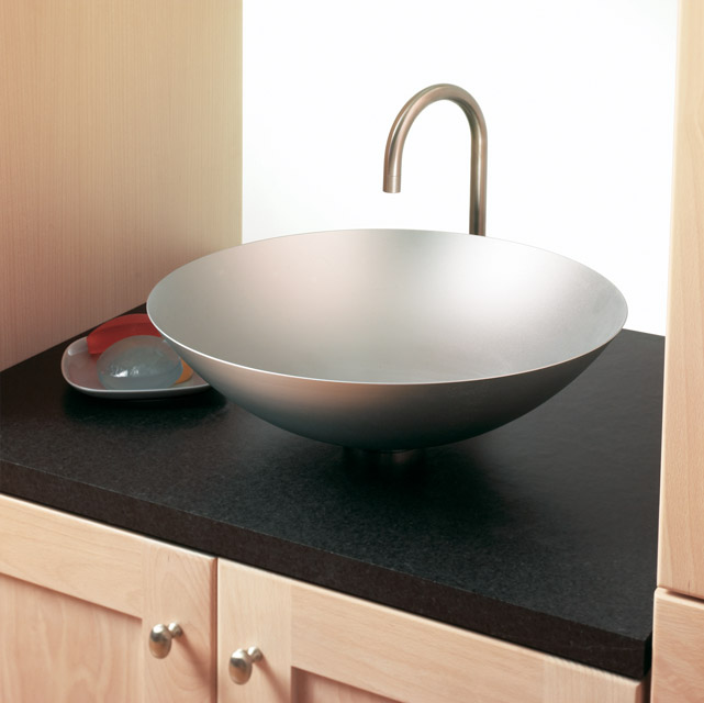 Soapstone can look as at home in a modern style bathroom as in a historic renovation.