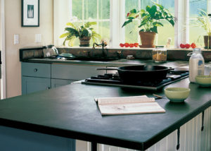 Vermont Soapstone countertops give this kitchen it's classic farmhouse look.