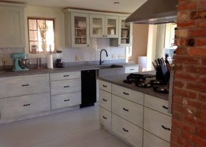 Vermont Soapstone is the classic choice for this stunning farmhouse kitchen.