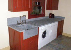 Vermont Soapstone countertop and deep sink make this a laundry room you'll like to spend time in.