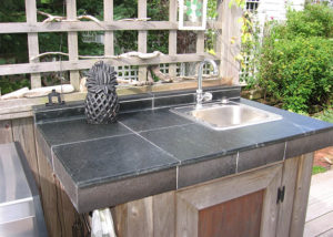 Outdoor kitchen with Vermont Soapstone tile countertop
