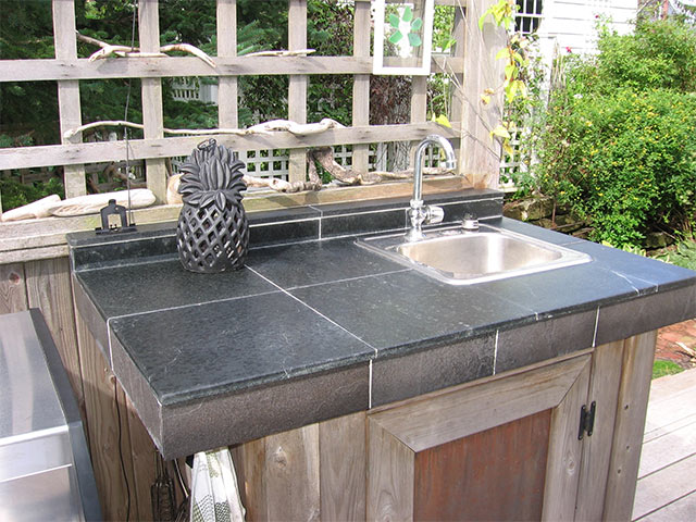 Outdoor kitchen with Vermont Soapstone tile countertop