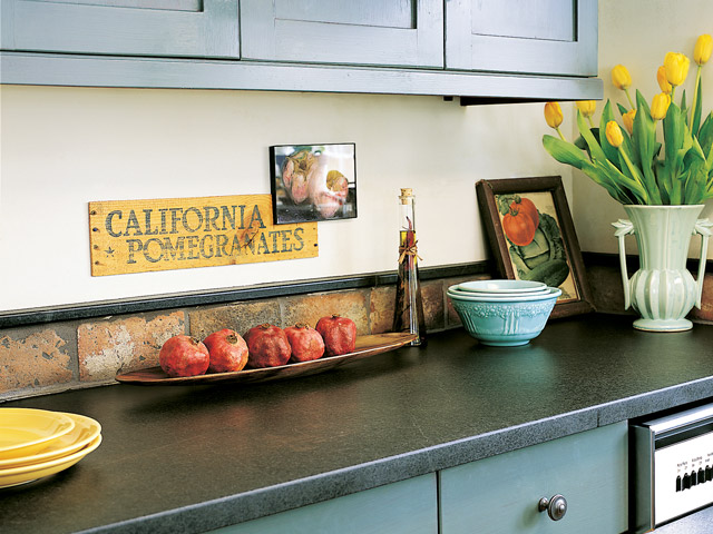 Beautiful kitchen featuring Vermont Soapstone custom countertops.
