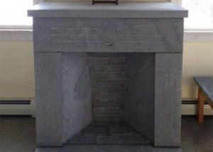 Soapstone can be used to build a a handsome free-standing fireplace with slabs and fire bricks.