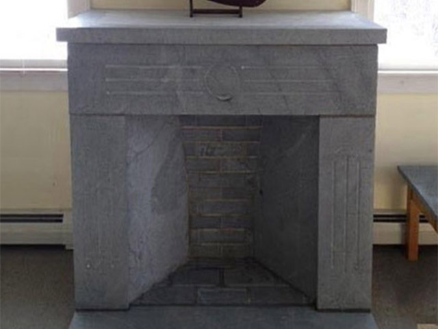 Soapstone can be used to build a a handsome free-standing fireplace with slabs and fire bricks.