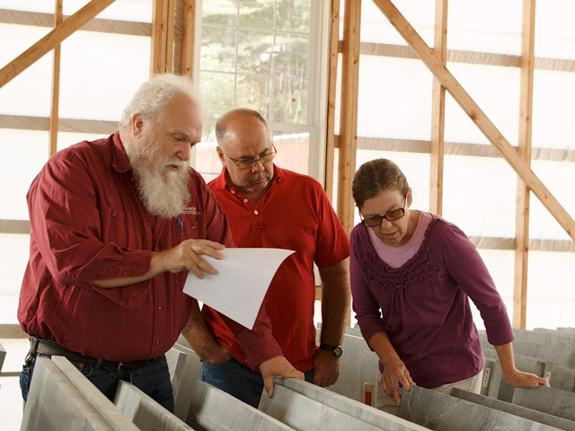 Customers choosing their unique soapstone slabs for a new custom kitchen