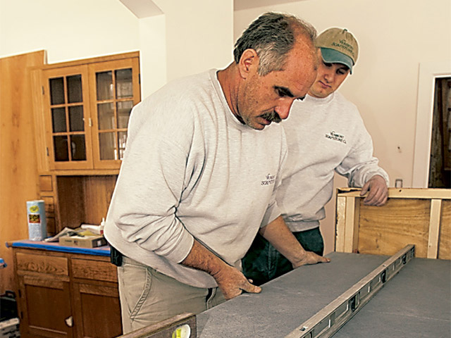 Vermont Soapstone's experienced installation teams custom cut right at your location to ensure a perfect fit.