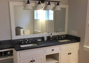 Vermont Soapstone counter and backsplash with inset porcelain sinks.