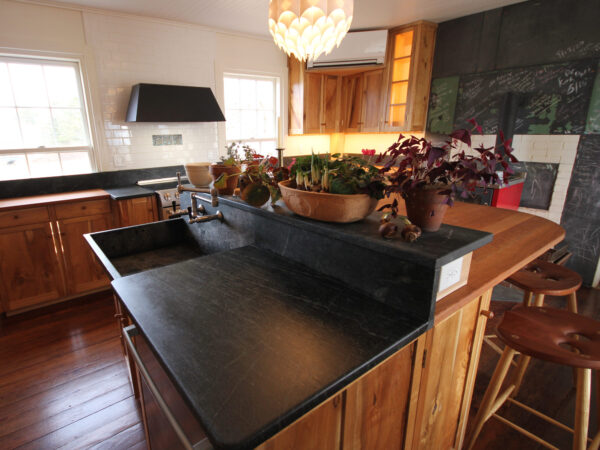 Vermont Soapstone makes stunning custom kitchen counters and apron front sinks.