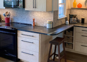 Mid-Century Modern kitchen with Vermont Soapstone counter.
