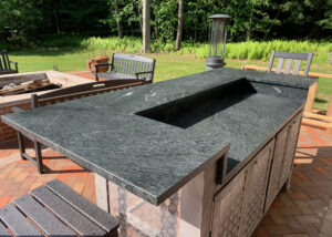 Stunning outdoor bar setup with Vermont Soapstone tile