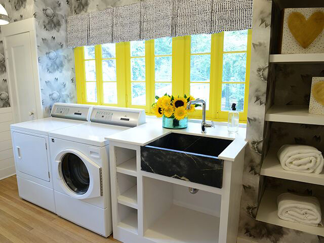 Beautiful Laundry Room Features Large Soapstone Sink